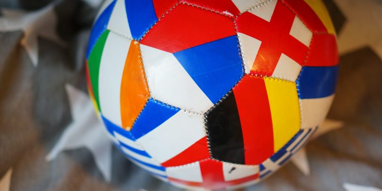 A  shot of a ball with flag prints